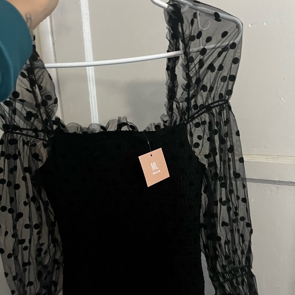 Black mini dress. Puffy polka dot sleeves. Brand New with tags from MissLola. - Picture 3 of 4